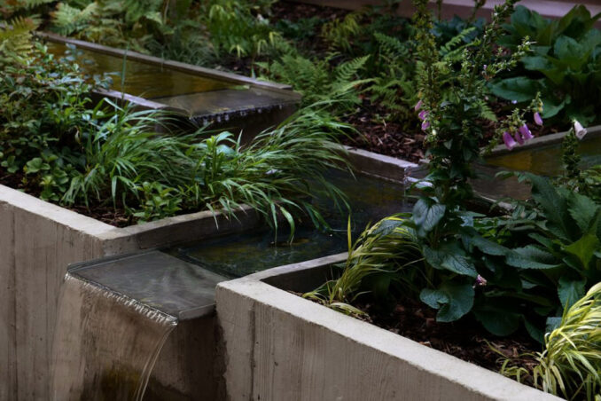 Appleby Blue - Landscape Architect: Grant Associates - Looking at water feature spillway with water trickling down